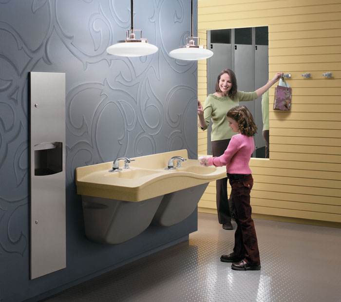woman and girl washing hands at a Frequency multi-height lavatory system