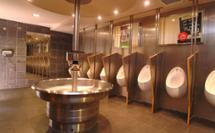 trendy looking restroom featuring stainless steel washfountain in Trafalgar Square