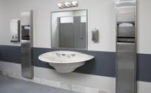 Public restroom with crescent sink made of Terreon solid surface